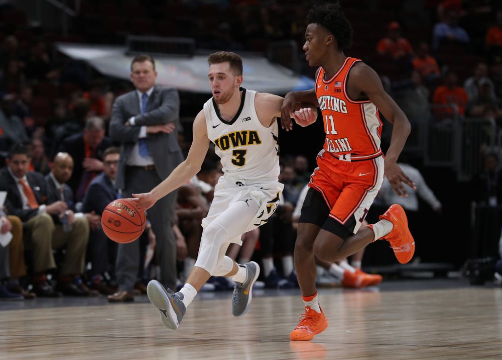 Iowa Hawkeyes guard Jordan Bohannon (3) against the Illinois Fighting Illini in the 2019 Big Ten Men's Basketball Tournament Thursday, March 14, 2019 at the United Center in Chicago. (Brian Ray/hawkeyesports.com)