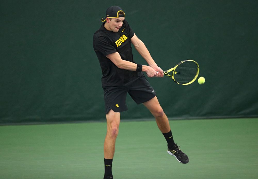 Iowa’s Joe Tyler returns a shot during his doubles match at the Hawkeye Tennis and Recreation Complex in Iowa City on Friday, March 6, 2020. (Stephen Mally/hawkeyesports.com)