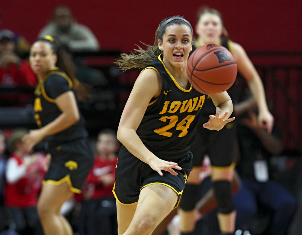 Iowa guard Gabbie Marshall (24) eyes a loose ball during the third quarter of their game at the Rutgers Athletic Center in Piscataway, N.J. on Sunday, March 1, 2020. (Stephen Mally/hawkeyesports.com)