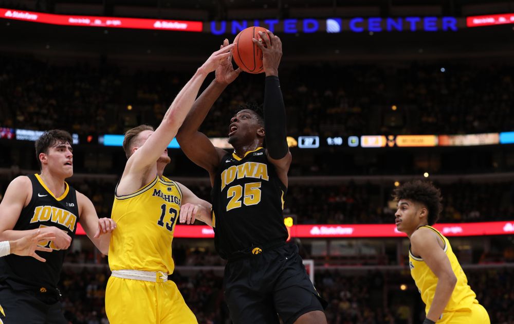 Iowa Hawkeyes forward Tyler Cook (25) against the Michigan Wolverines in the 2019 Big Ten Men's Basketball Tournament Friday, March 15, 2019 at the United Center in Chicago. (Brian Ray/hawkeyesports.com)