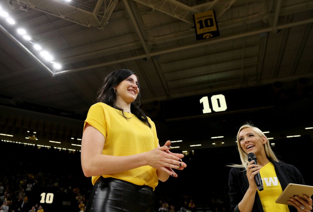 Megan Gustafson smiles after her number was raised into the rafters during a jersey retirement ceremony Sunday, January 26, 2020 at Carver-Hawkeye Arena. (Brian Ray/hawkeyesports.com)