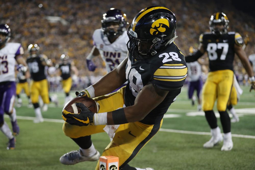 Iowa Hawkeyes running back Toren Young (28) scores against the Northern Iowa Panthers Saturday, September 15, 2018 at Kinnick Stadium. (Max Allen/hawkeyesports.com)