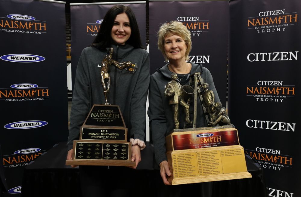 Iowa Hawkeyes forward Megan Gustafson (10)  with the Naismith Player Of The Year Trophy and head coach Lisa Bluder with the Naismith Coach Of the Year Trophy during the teamÕs Celebr-Eight event Wednesday, April 24, 2019 at Carver-Hawkeye Arena. (Brian Ray/hawkeyesports.com)