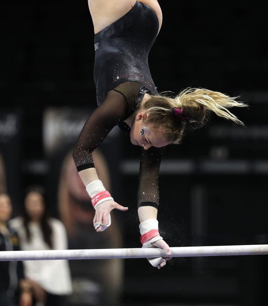 Iowa's Charlotte Sullivan competes on the bars during their meet against the Minnesota Golden Gophers Saturday, January 19, 2019 at Carver-Hawkeye Arena. (Brian Ray/hawkeyesports.com)