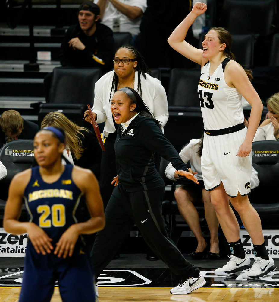 Iowa Hawkeyes guard Tania Davis (11), Iowa Hawkeyes forward Amanda Ollinger (43)