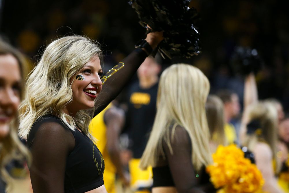 An Iowa Spirit Squad member smiles to the crowd during the Iowa men’s basketball game vs Rutgers on Wednesday, January 22, 2020 at Carver-Hawkeye Arena. (Lily Smith/hawkeyesports.com)
