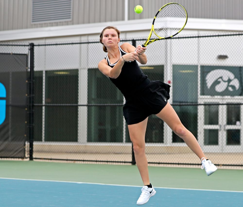 Iowa's Cloe Ruette returns a shot during their doubles match against Rutgers at the Hawkeye Tennis and Recreation Complex in Iowa City on Friday, Apr. 5, 2019. (Stephen Mally/hawkeyesports.com)
