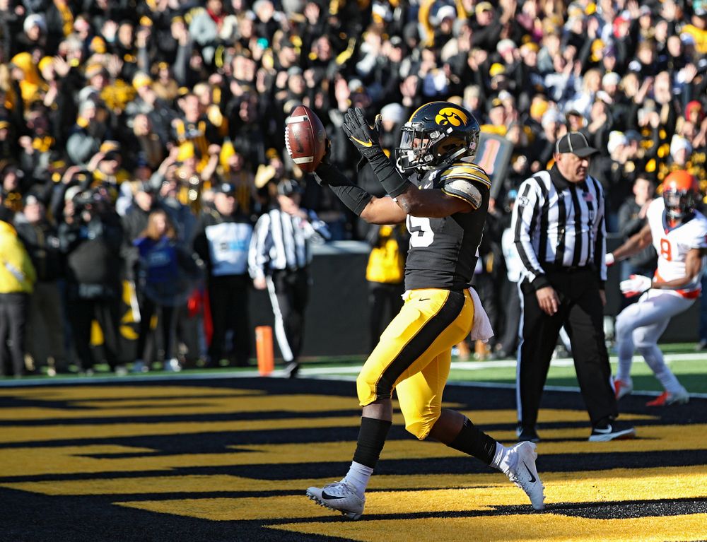 Iowa Hawkeyes running back Tyler Goodson (15) celebrates after scoring a touchdown during the first quarter of their game at Kinnick Stadium in Iowa City on Saturday, Nov 23, 2019. (Stephen Mally/hawkeyesports.com)