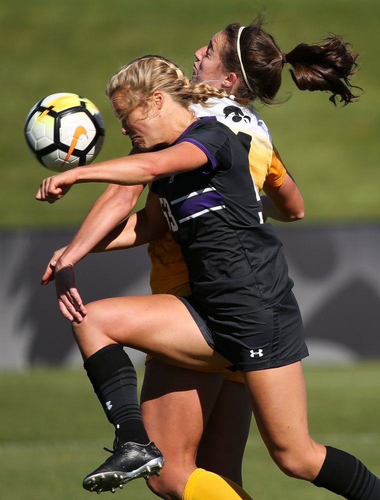 Iowa Hawkeyes forward Kaleigh Haus (4) heads the ball during a game against Northwestern at the Iowa Soccer Complex on October 21, 2018. (Tork Mason/hawkeyesports.com)