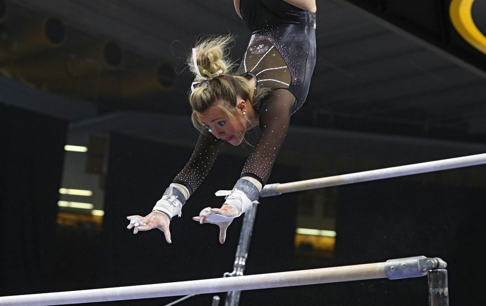 Iowa’s Maddie Kampschroder competes on the bars during their meet at Carver-Hawkeye Arena in Iowa City on Sunday, March 8, 2020. (Stephen Mally/hawkeyesports.com)
