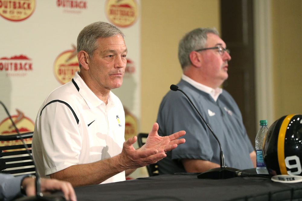Iowa Hawkeyes head coach Kirk Ferentz and Mississippi State head coach Joe Moorhead answer questions during the Outback Bowl coach's press conference Saturday, December 29, 2018 in Tampa, FL. (Brian Ray/hawkeyesports.com)