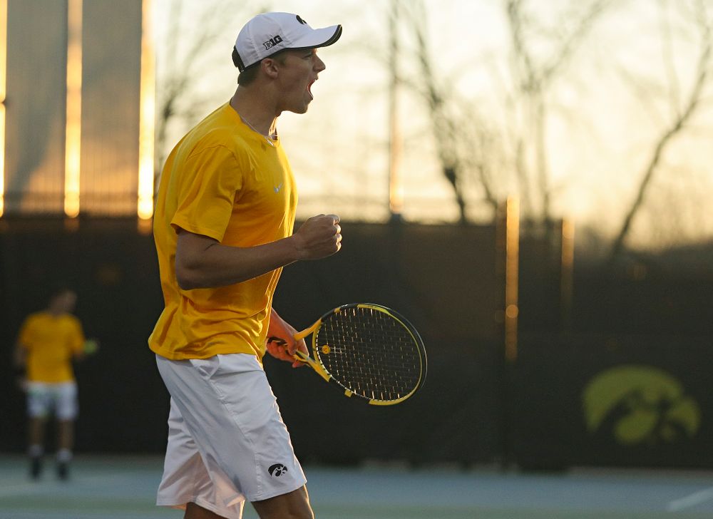 Iowa's Joe Tyler celebrates after winning his match again Michigan State at the Hawkeye Tennis and Recreation Complex in Iowa City on Friday, Apr. 19, 2019. (Stephen Mally/hawkeyesports.com)