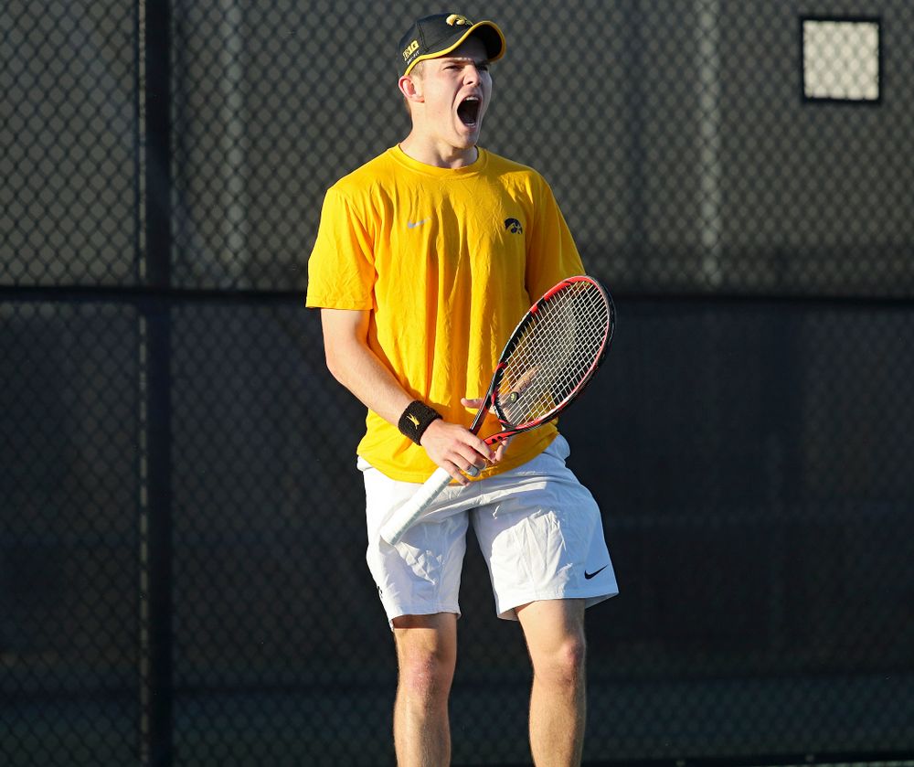 Iowa's Jonas Larsen celebrates a point during his match again Michigan State at the Hawkeye Tennis and Recreation Complex in Iowa City on Friday, Apr. 19, 2019. (Stephen Mally/hawkeyesports.com)