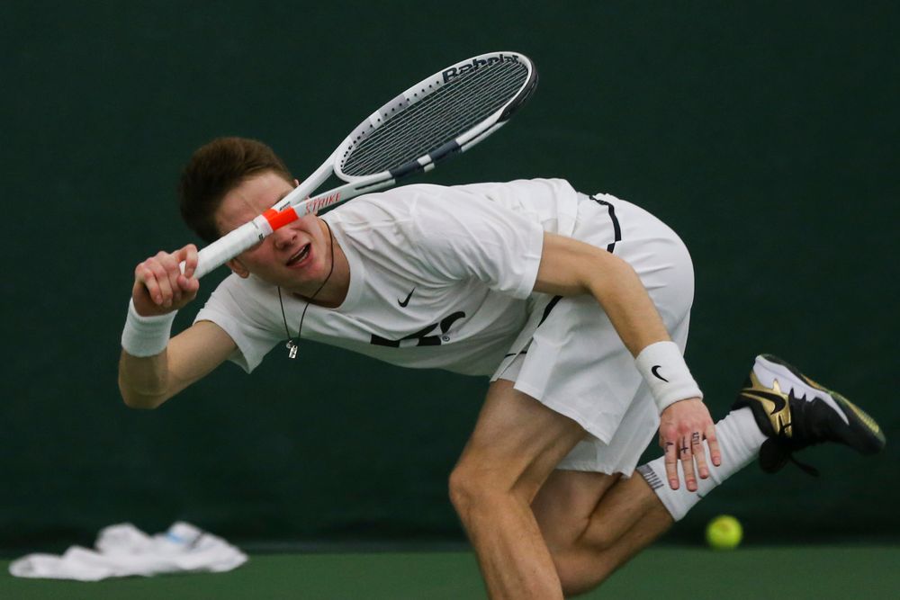 Iowa’s Jason Kerst dives to hit a forehand during the Iowa men’s tennis match vs Western Michigan on Saturday, January 18, 2020 at the Hawkeye Tennis and Recreation Complex. (Lily Smith/hawkeyesports.com)
