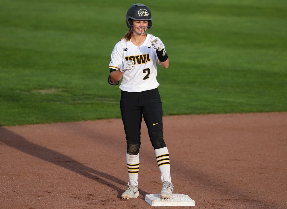 Iowa second baseman Aralee Bogar (2) points into the dugout after hitting a double during the fifth inning of their game against Ohio State at Pearl Field in Iowa City on Friday, May. 3, 2019. (Stephen Mally/hawkeyesports.com)