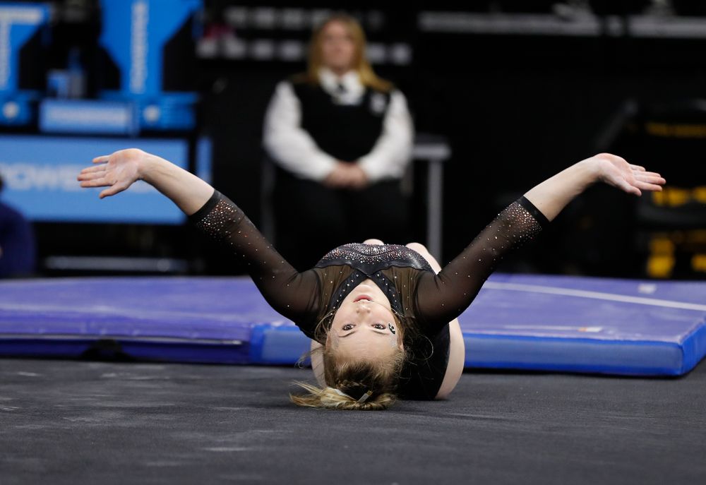Charlotte Sullivan competes on the floor  