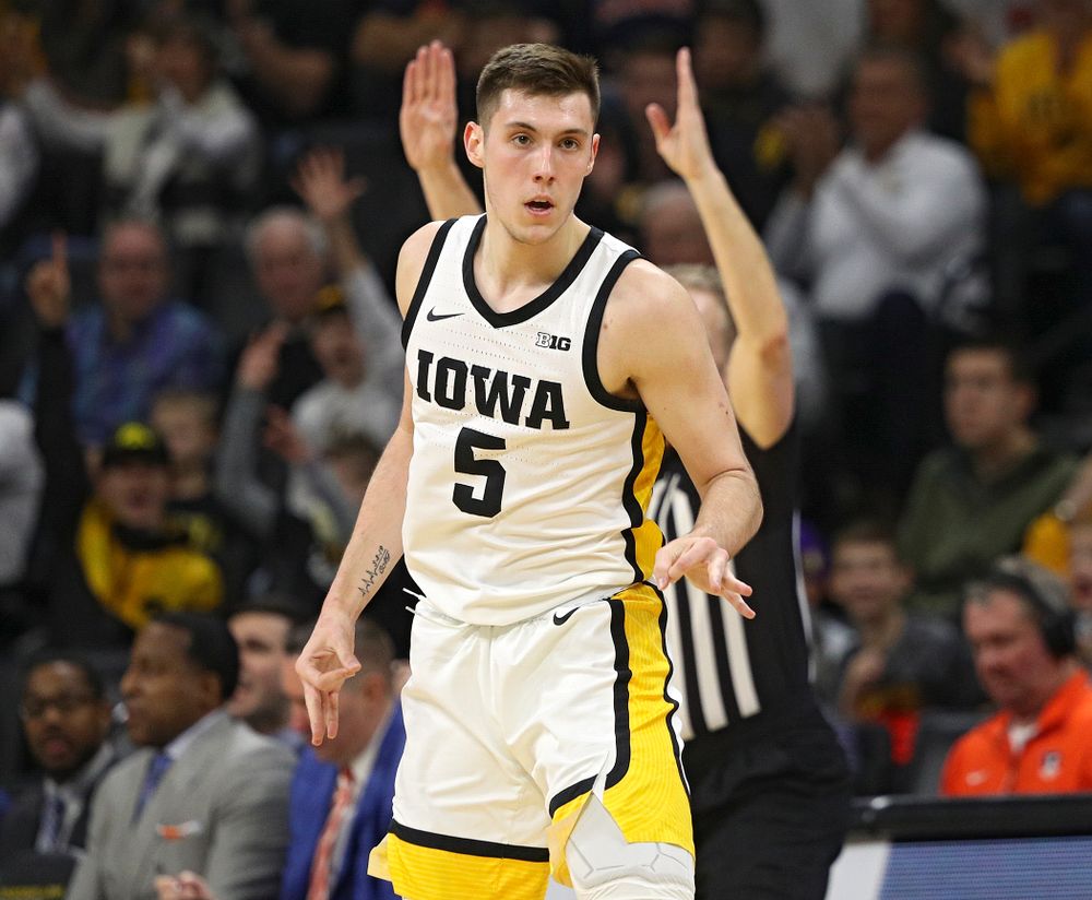 Iowa Hawkeyes guard CJ Fredrick (5) celebrates after making a 3-pointer during the first quarter of the game at Carver-Hawkeye Arena in Iowa City on Sunday, February 2, 2020. (Stephen Mally/hawkeyesports.com)