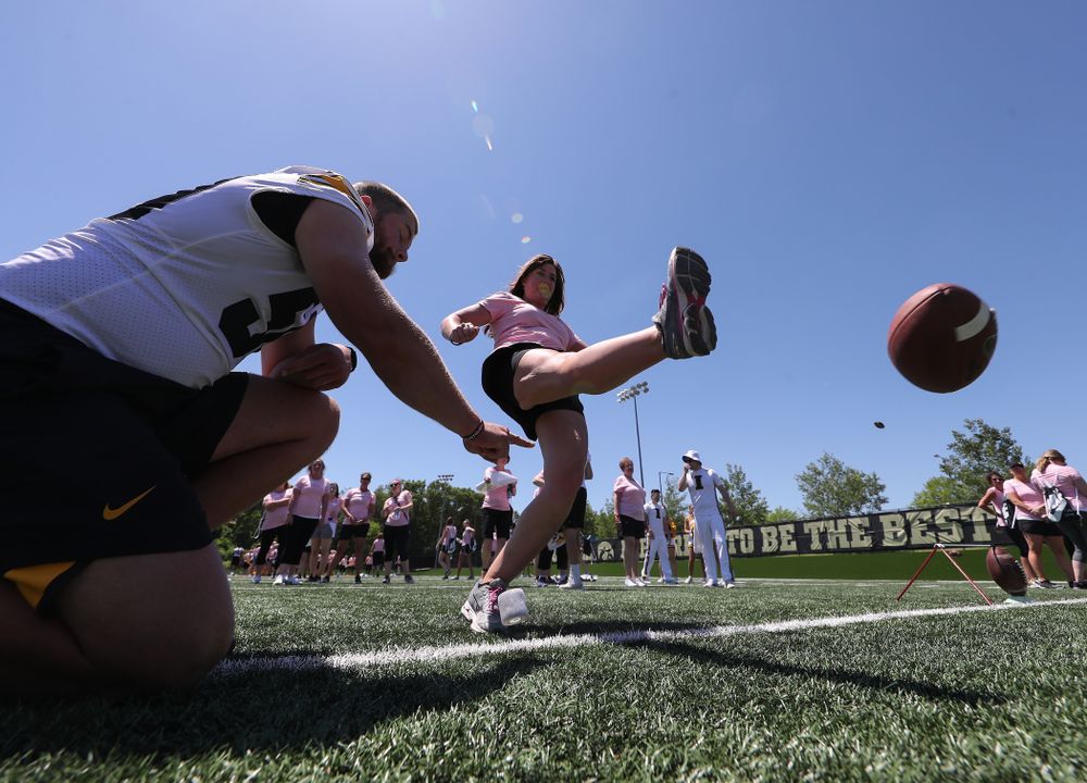 A women attempts to kick a field goal during the 2019 Iowa Ladies Football Academy Saturday, June 8, 2019 at the Hansen Football Performance Center. (Brian Ray/hawkeyesports.com)