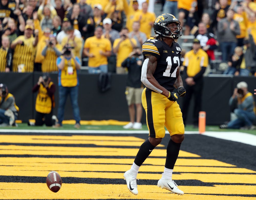 Iowa Hawkeyes wide receiver Brandon Smith (12) celebrates after scoring a touchdown against Middle Tennessee State Saturday, September 28, 2019 at Kinnick Stadium. (Brian Ray/hawkeyesports.com)