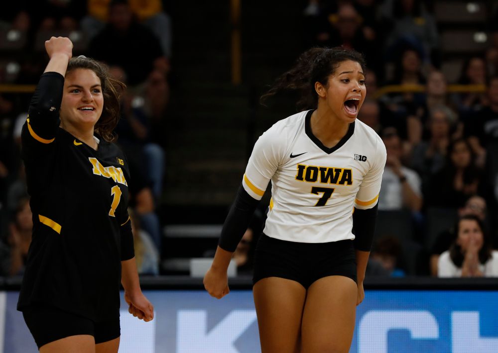 Iowa Hawkeyes setter Gabrielle Orr (7) and defensive specialist Molly Kelly (1) against the Michigan Wolverines Sunday, September 23, 2018 at Carver-Hawkeye Arena. (Brian Ray/hawkeyesports.com)
