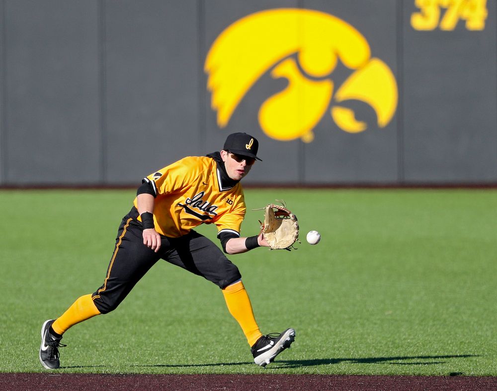 Iowa Hawkeyes second baseman Mitchell Boe (4) fields a ground ball during the fourth inning of their game at Duane Banks Field in Iowa City on Tuesday, Apr. 2, 2019. (Stephen Mally/hawkeyesports.com)