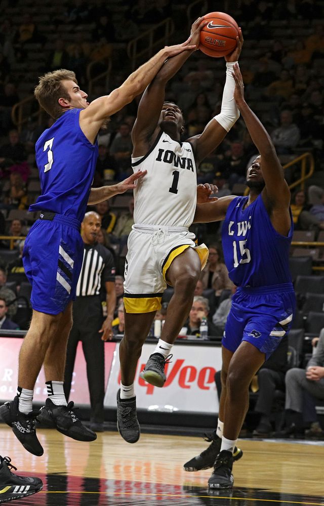 Iowa Hawkeyes guard Joe Toussaint (1) is fouled as he shoots during the second half of their exhibition game against Lindsey Wilson College at Carver-Hawkeye Arena in Iowa City on Monday, Nov 4, 2019. (Stephen Mally/hawkeyesports.com)