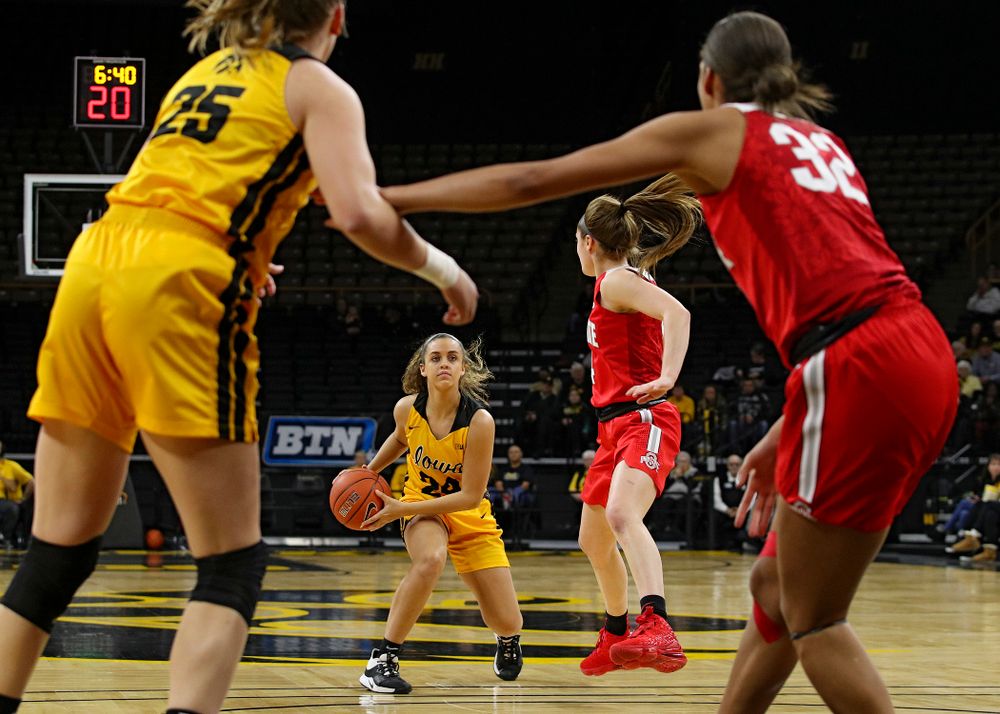 Iowa Hawkeyes guard Gabbie Marshall (24) looks to pass during the first quarter of their game at Carver-Hawkeye Arena in Iowa City on Thursday, January 23, 2020. (Stephen Mally/hawkeyesports.com)