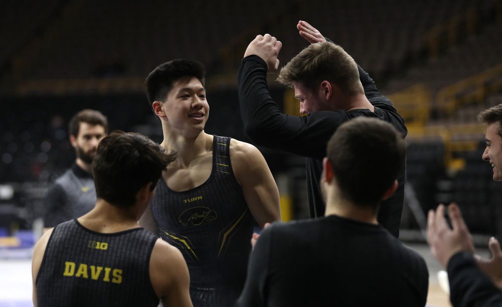 Iowa's Bennet Huang competes on the high bar against the Ohio State Buckeyes Saturday, March 16, 2019 at Carver-Hawkeye Arena.  (Brian Ray/hawkeyesports.com)