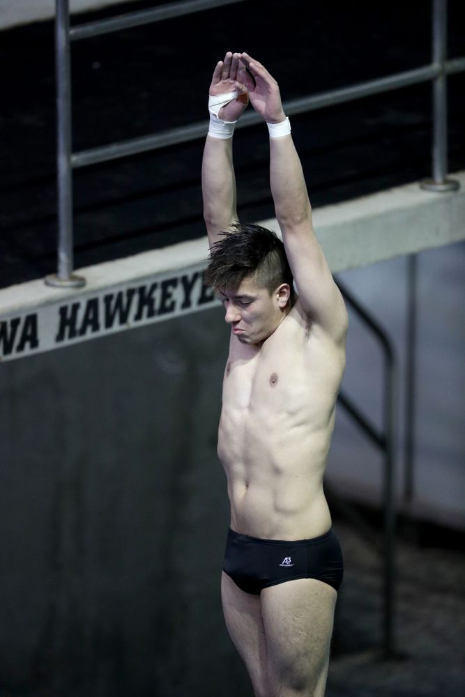 IowaÕs Jonatan Posligua competes on the 1 meter springboard against Notre Dame and Illinois Saturday, January 11, 2020 at the Campus Recreation and Wellness Center.  (Brian Ray/hawkeyesports.com)