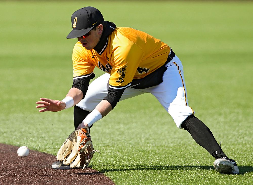 Iowa Hawkeyes second baseman Mitchell Boe (4) fields a ground ball during the eighth inning against Illinois at Duane Banks Field in Iowa City on Sunday, Mar. 31, 2019. (Stephen Mally/hawkeyesports.com)