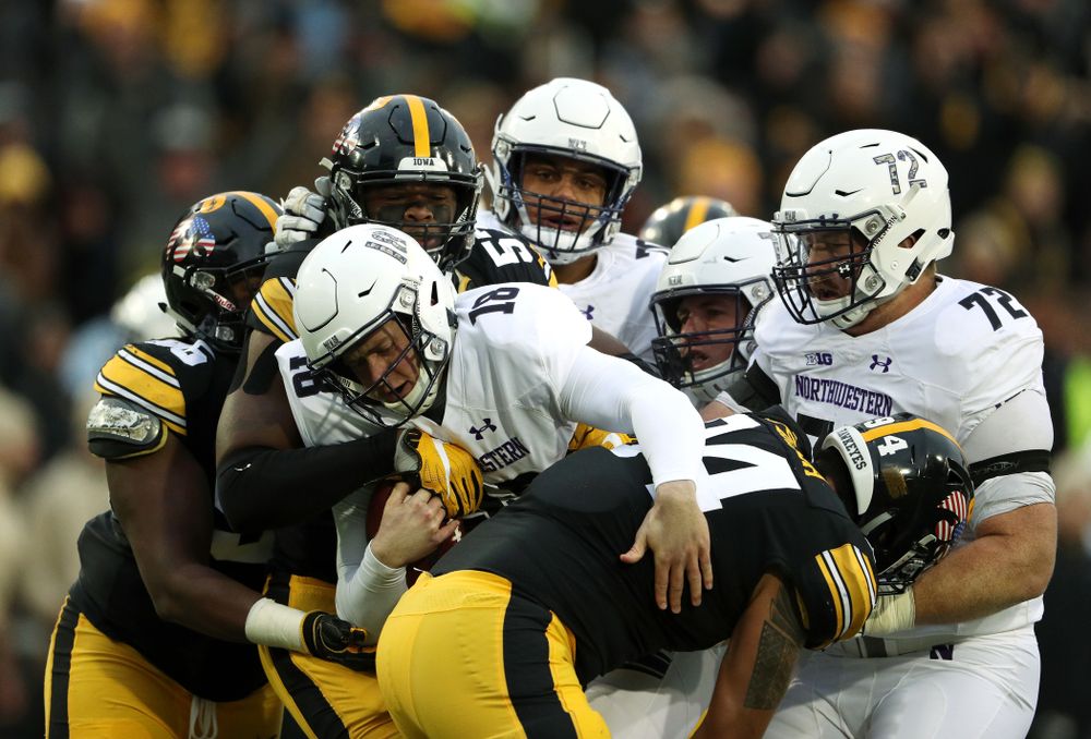 Iowa Hawkeyes defensive end Chauncey Golston (57) and defensive end A.J. Epenesa (94) against the Northwestern Wildcats Saturday, November 10, 2018 at Kinnick Stadium. (Brian Ray/hawkeyesports.com)