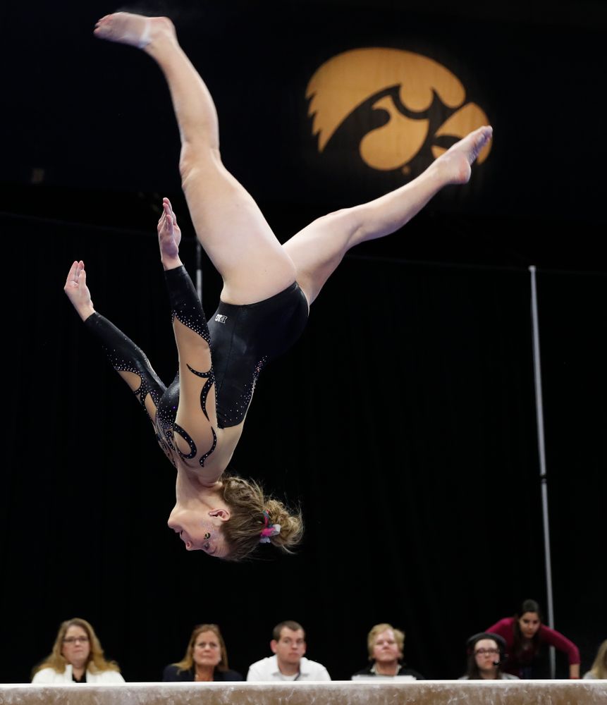 Iowa's Sydney Hogan competes on the beam