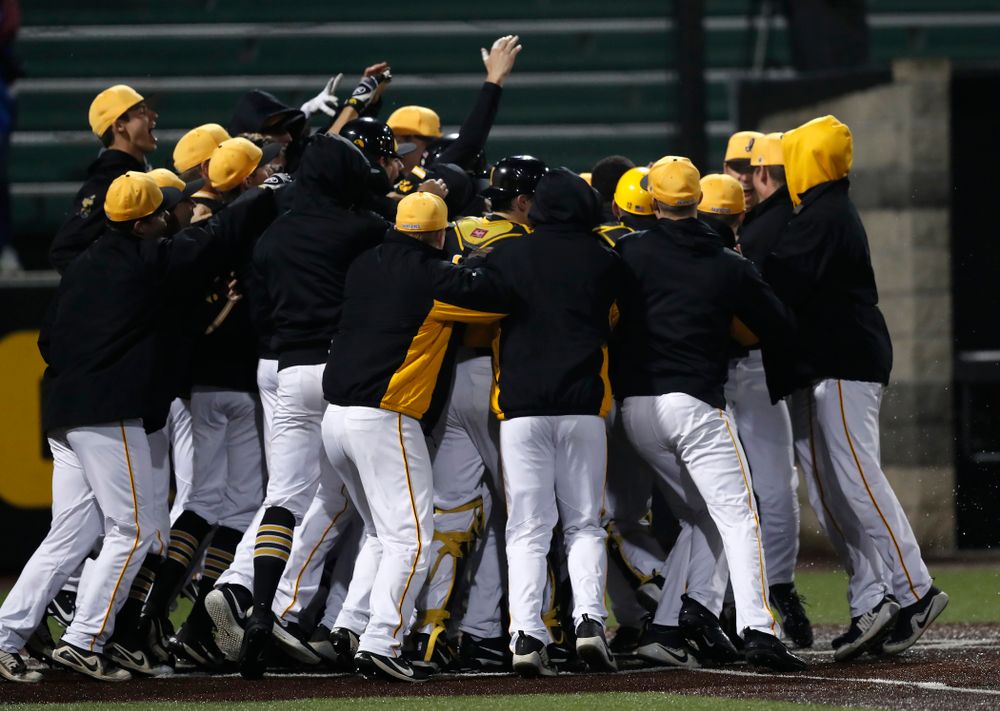 Iowa Hawkeyes catcher Tyler Cropley (5) celebrates after hitting a walk off grand slam in the bottom of the ninth against the Bradley Braves Wednesday, March 28, 2018 at Duane Banks Field. (Brian Ray/hawkeyesports.com)