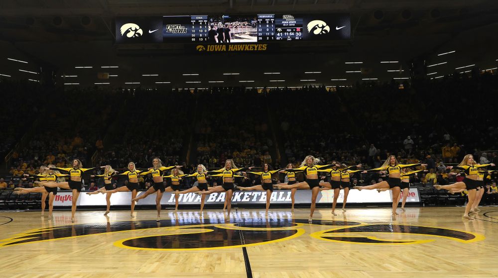 The Iowa Spirit Squad performs with participants in Spirit Squad Day at halftime of the Iowa Hawkeyes game against the Nebraska Cornhuskers Saturday, February 8, 2020 at Carver-Hawkeye Arena. (Brian Ray/hawkeyesports.com)
