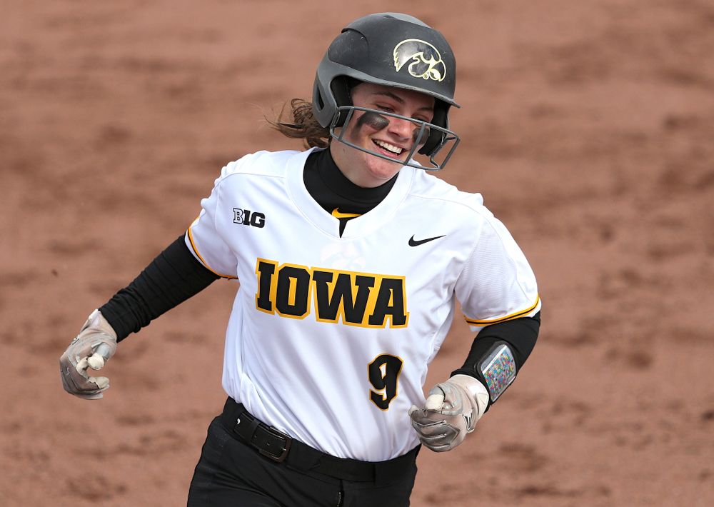 Iowa catcher Abby Lien (9) rounds the bases after hitting a home run during the second inning of their game against Illinois at Pearl Field in Iowa City on Friday, Apr. 12, 2019. (Stephen Mally/hawkeyesports.com)