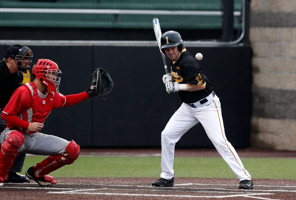 Iowa Hawkeyes infielder Chris Whelan (28) is hit by a pitch against the Bradley Braves Wednesday, March 28, 2018 at Duane Banks Field. (Brian Ray/hawkeyesports.com)