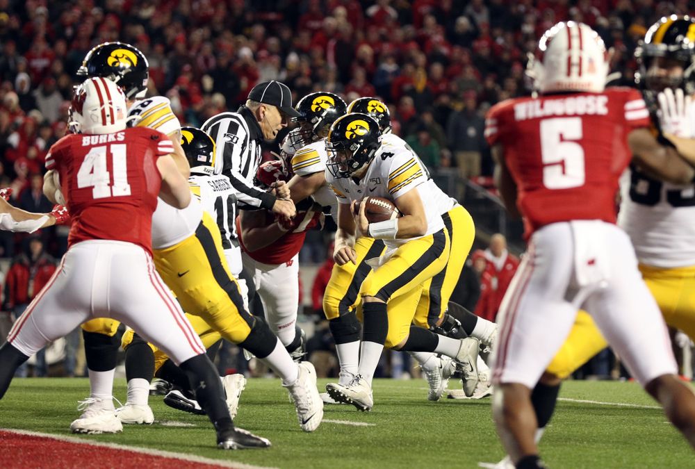 Iowa Hawkeyes quarterback Nate Stanley (4) against the Wisconsin Badgers Saturday, November 9, 2019 at Camp Randall Stadium in Madison, Wisc. (Brian Ray/hawkeyesports.com)