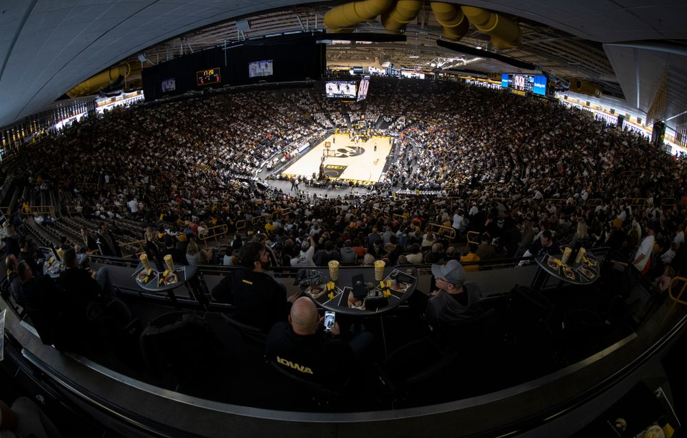 Fans sit in the terrace tables as the Iowa Hawkeyes take on  the Illinois Fighting Illini Sunday, January 20