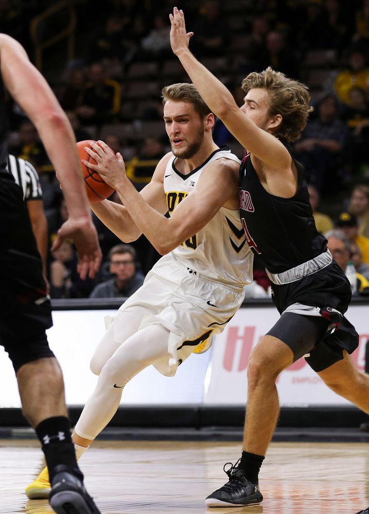 Iowa Hawkeyes forward Riley Till (20) drives to the basket during a game against Guilford College at Carver-Hawkeye Arena on November 4, 2018. (Tork Mason/hawkeyesports.com)
