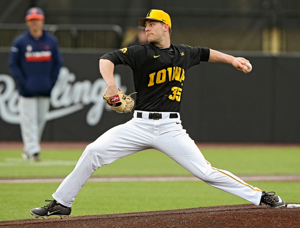 Iowa Hawkeyes pitcher Cam Baumann (35) delivers to the plate during the first inning of their game against Illinois at Duane Banks Field in Iowa City on Saturday, Mar. 30, 2019. (Stephen Mally/hawkeyesports.com)