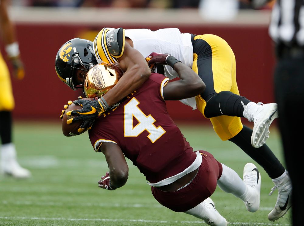 Iowa Hawkeyes wide receiver Brandon Smith (12) makes a catch against the Minnesota Golden Gophers Saturday, October 6, 2018 at TCF Bank Stadium. (Brian Ray/hawkeyesports.com)