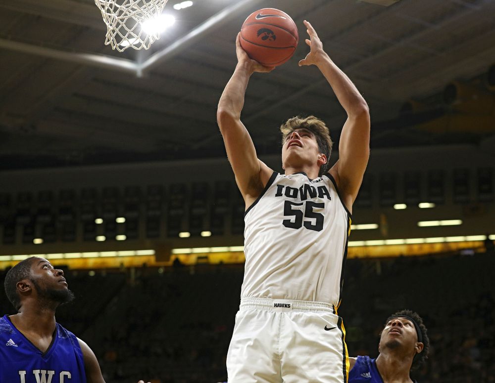 Iowa Hawkeyes center Luka Garza (55) makes a basket during the first half of their exhibition game against Lindsey Wilson College at Carver-Hawkeye Arena in Iowa City on Monday, Nov 4, 2019. (Stephen Mally/hawkeyesports.com)