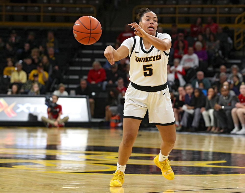 Iowa Hawkeyes guard Alexis Sevillian (5) passes the ball during the third quarter of the game at Carver-Hawkeye Arena in Iowa City on Thursday, February 6, 2020. (Stephen Mally/hawkeyesports.com)