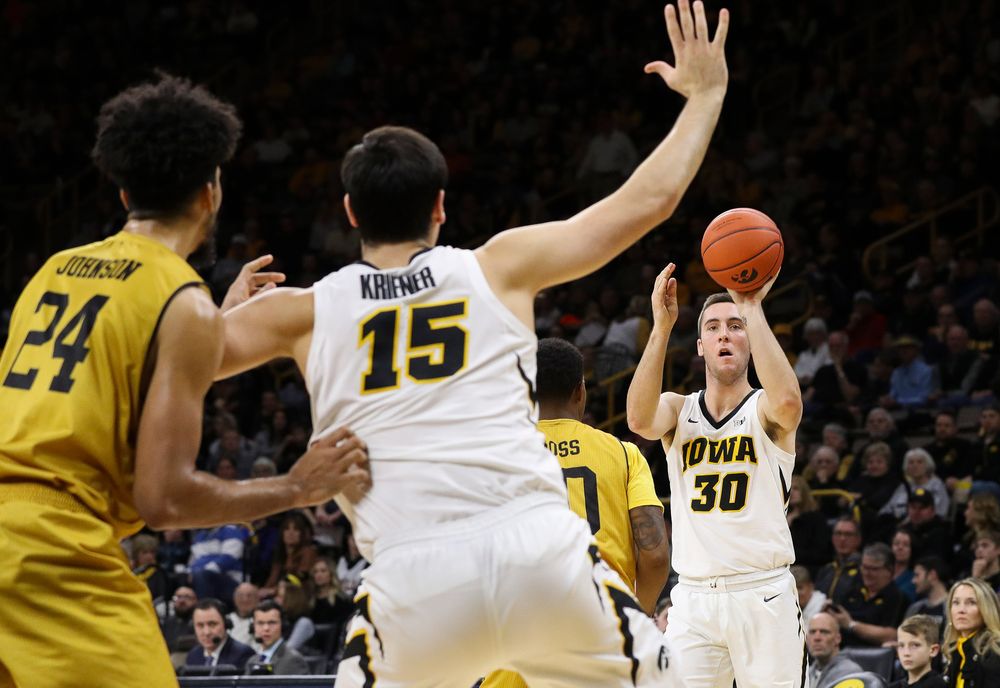 Iowa Hawkeyes guard Connor McCaffery (30) passes the ball during a game against Alabama State at Carver-Hawkeye Arena on November 21, 2018. (Tork Mason/hawkeyesports.com)