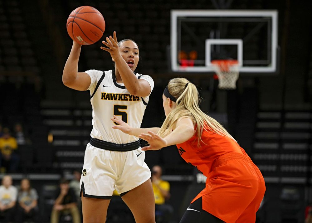 Iowa guard Alexis Sevillian (5) passes the ball during the first quarter of their overtime win against Princeton at Carver-Hawkeye Arena in Iowa City on Wednesday, Nov 20, 2019. (Stephen Mally/hawkeyesports.com)