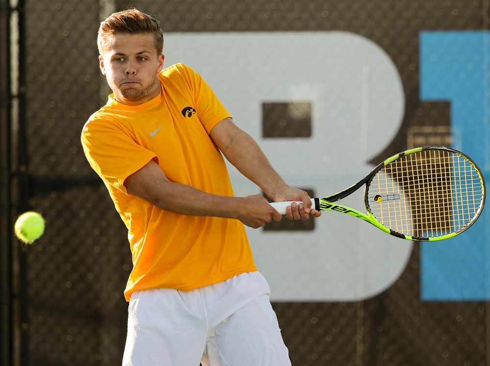 Iowa's Will Davies during their doubles match again Michigan State at the Hawkeye Tennis and Recreation Complex in Iowa City on Friday, Apr. 19, 2019. (Stephen Mally/hawkeyesports.com)