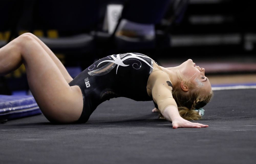 Iowa's Charlotte Sullivan competes on the floor against the Nebraska Cornhuskers 