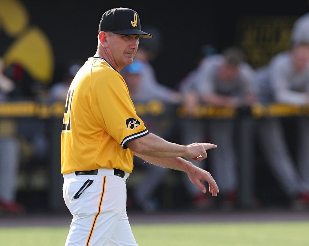 Iowa Hawkeyes head coach Rick Heller signals to the bullpen during the fourth inning of their game against Northern Illinois at Duane Banks Field in Iowa City on Tuesday, Apr. 16, 2019. (Stephen Mally/hawkeyesports.com)