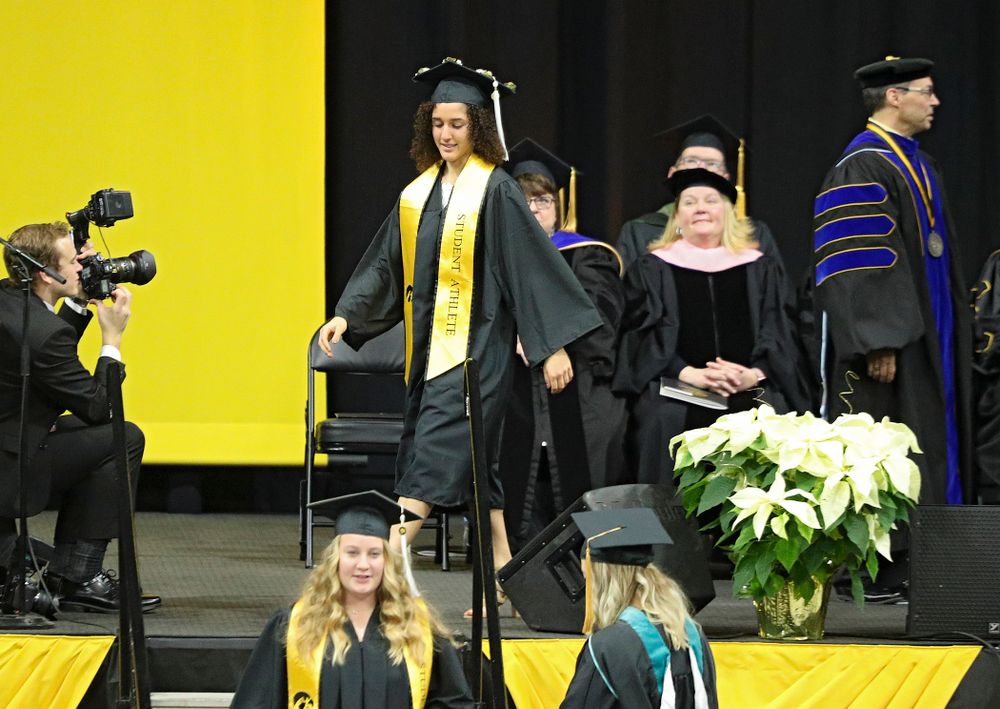 Iowa Track and Field’s Tia Saunders during the College of Liberal Arts and Sciences and University College Fall 2019 Commencement ceremony at Carver-Hawkeye Arena in Iowa City on Saturday, December 21, 2019. (Stephen Mally/hawkeyesports.com)