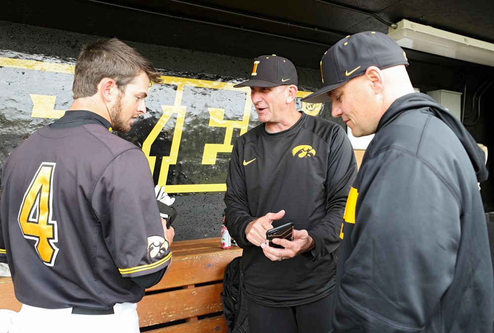 Iowa Mitchell Boe (from left), head coach Rick Heller, and assistant coach Robin Lund at Duane Banks Field in Iowa City on Monday, May 20, 2019. (Stephen Mally/hawkeyesports.com)